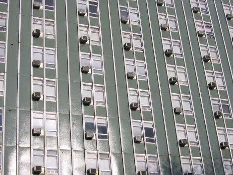 tall building with air conditioning units Greece 