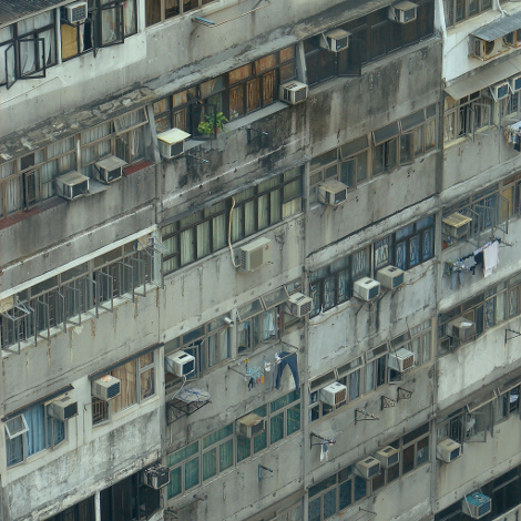 Dirty building with air con units