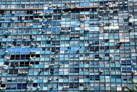 blue building with air conditioners