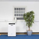 EasyCool 3.5kW portable air conditioner in an Office with hose out the window