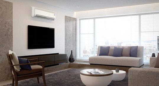 White wall mounted air conditioner in a living lounge